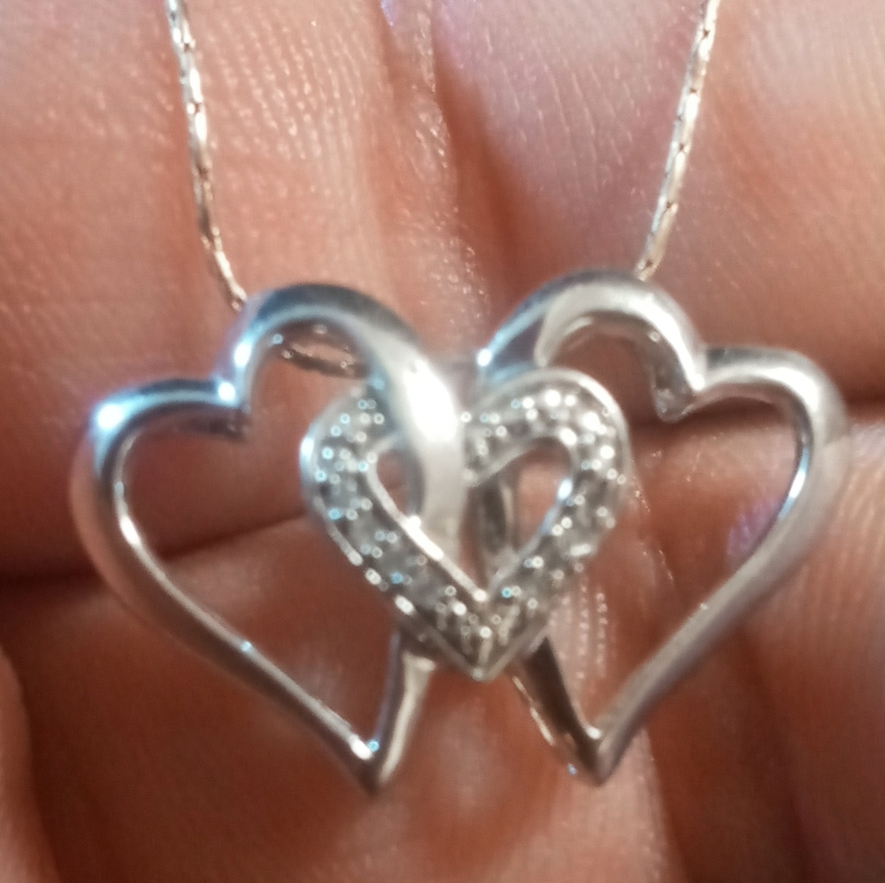 Vintage 3 heart pendant with pave diamonds in in 925 silver. On 925 round box .